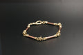 09-9ct bar and knot link bracelet