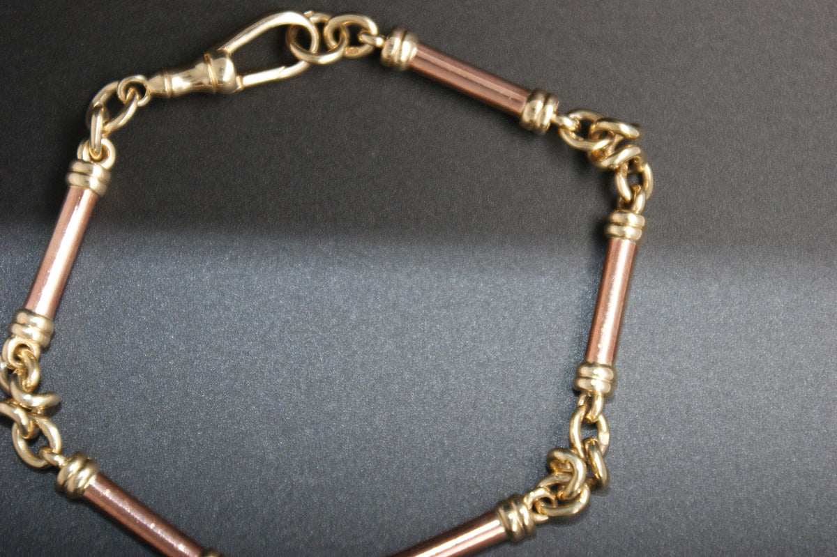 09-9ct bar and knot link bracelet
