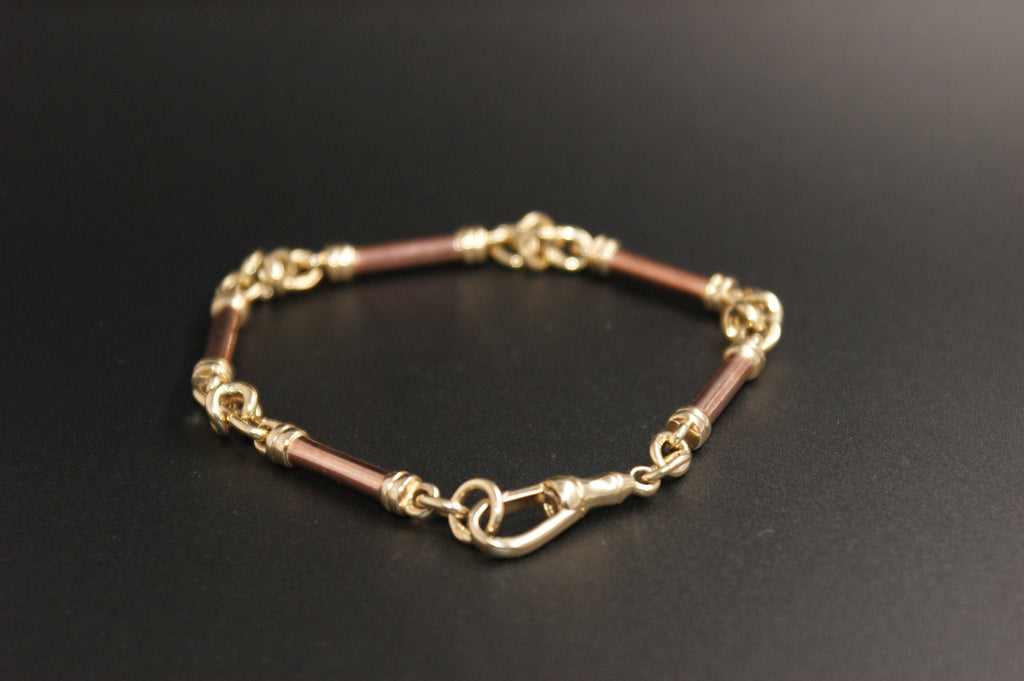 09-9ct bar and knot link bracelet