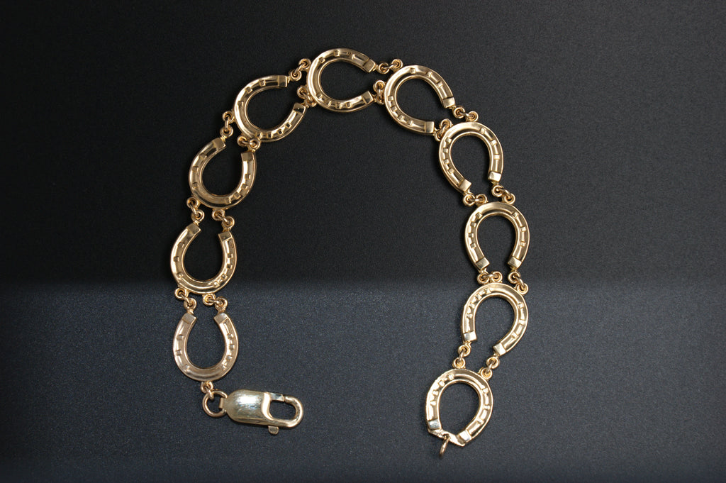023-9ct Gold Lucky Horseshoe link Bracelet (8'').