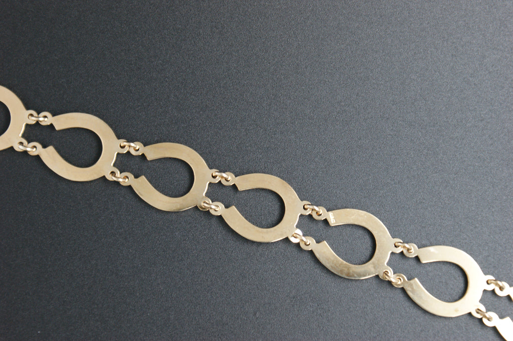 023-9ct Gold Lucky Horseshoe link Bracelet (8'').