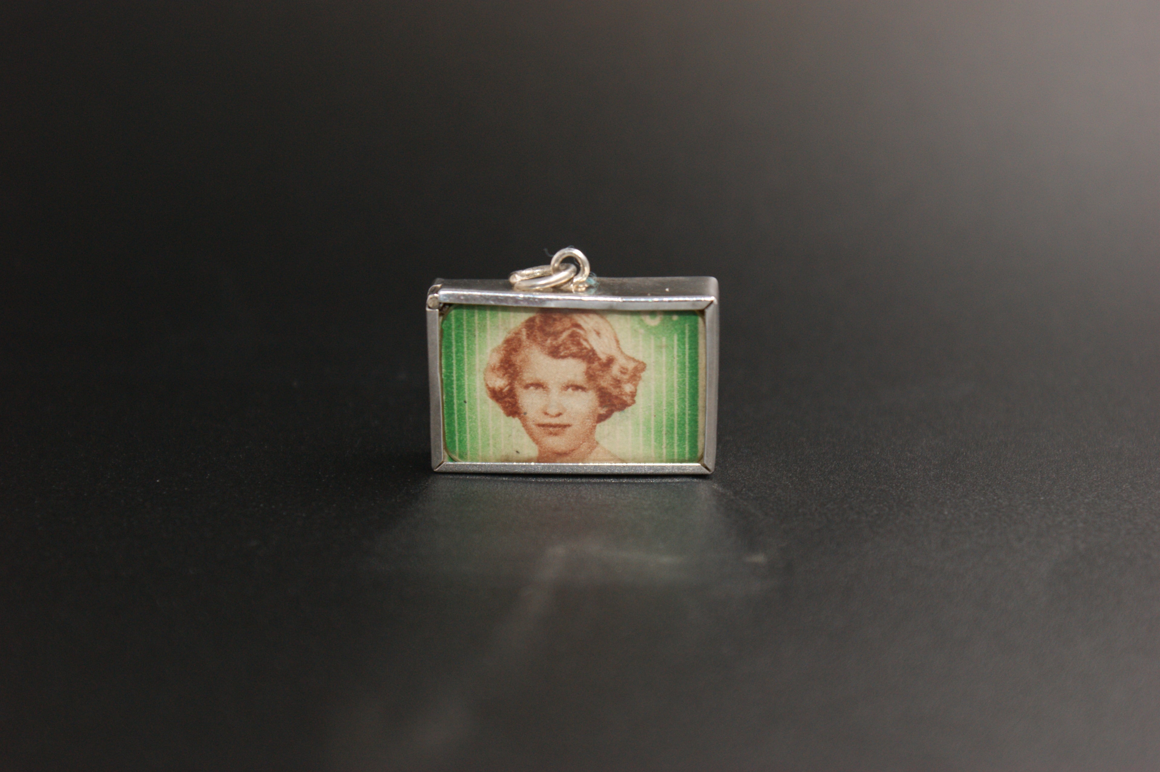 028- Silver Princess Anne and King Charles saving stamp charm