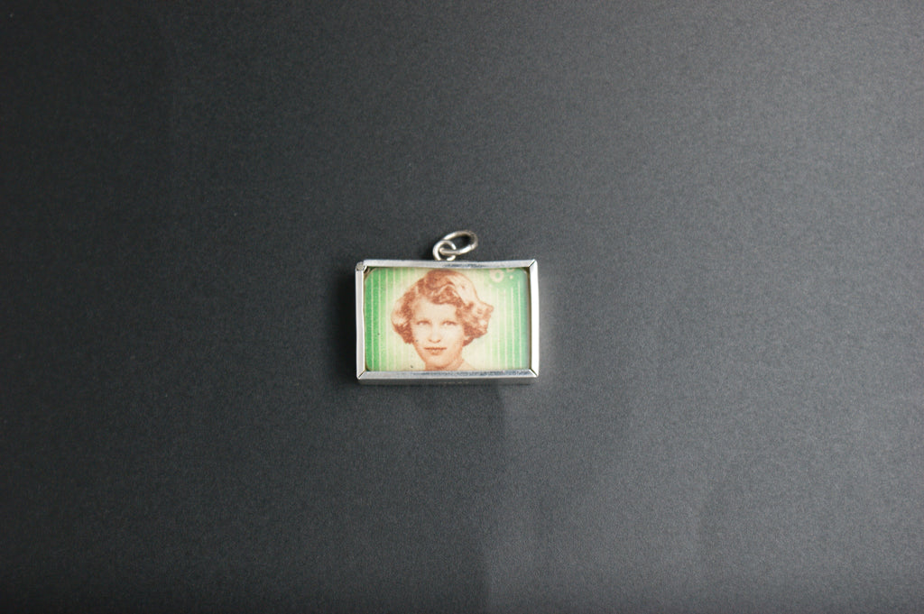 028- Silver Princess Anne and King Charles saving stamp charm