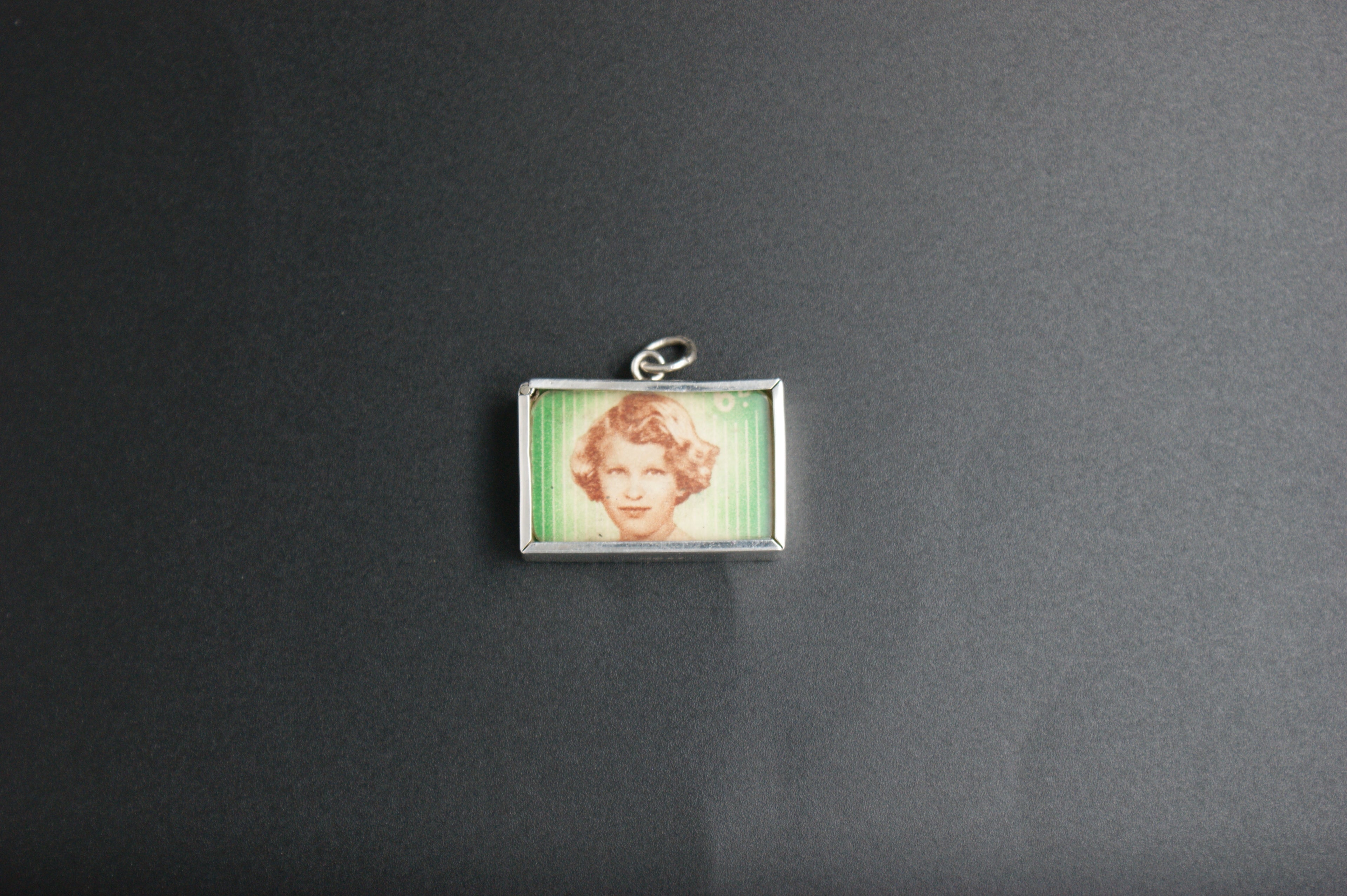 028- Silver Princess Anne and King Charles saving stamp charm