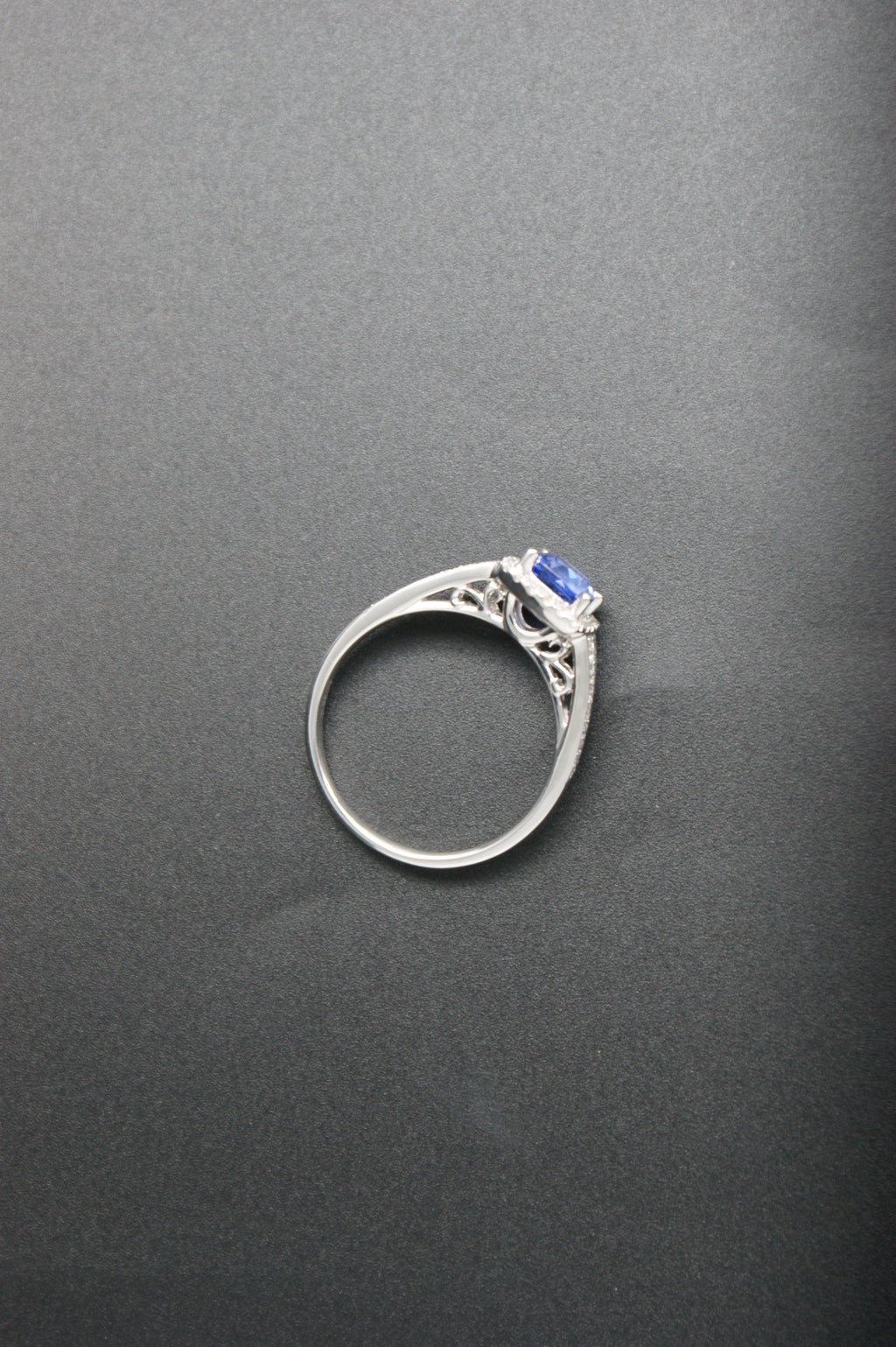 032-18ct White Gold Tanzanite & 0.22ct Diamond Cushion Halo Ring