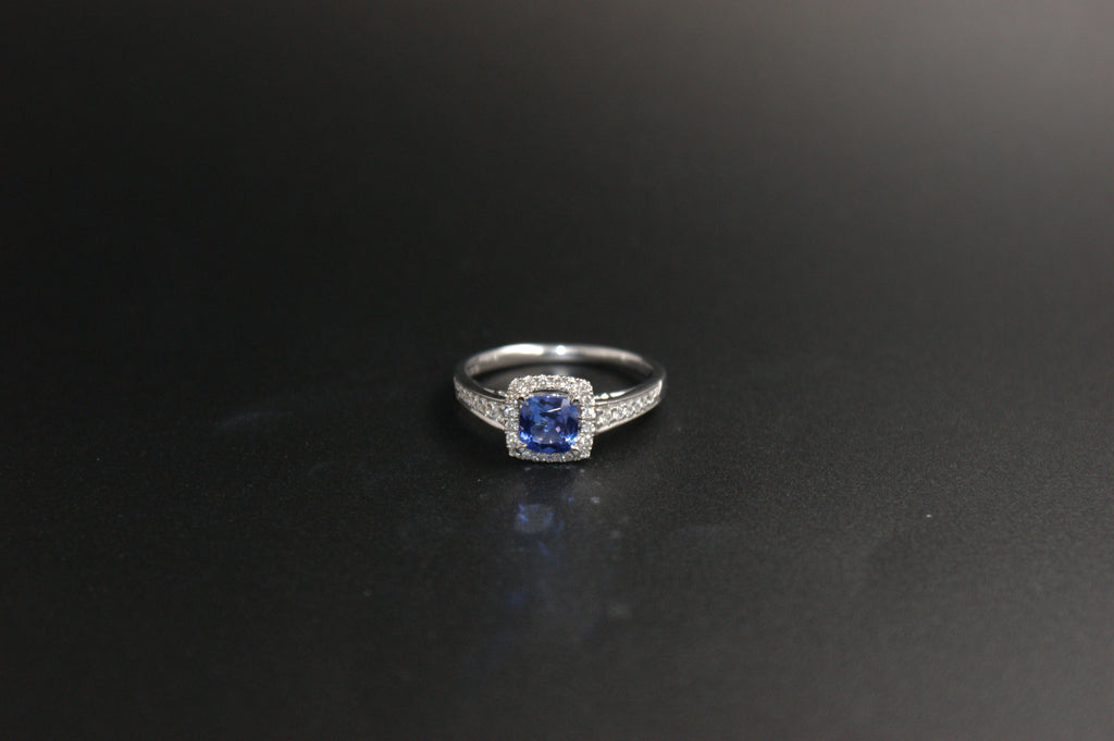 032-18ct White Gold Tanzanite & 0.22ct Diamond Cushion Halo Ring