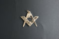 039-9ct Gold Folding/Articulated Engraved Masonic Square & Compasses Pendent.