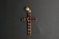 043- 18ct Gold Garnet Cross Pendant