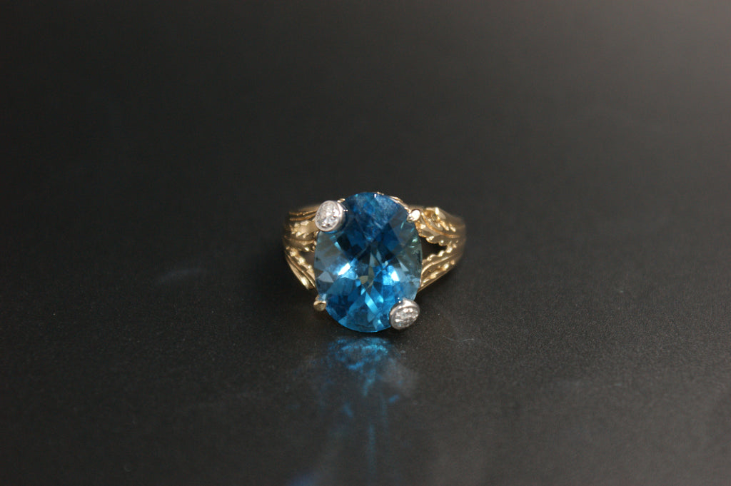 045- 9ct Blue Topaz & Diamond Solitaire Ring