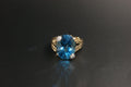 045- 9ct Blue Topaz & Diamond Solitaire Ring