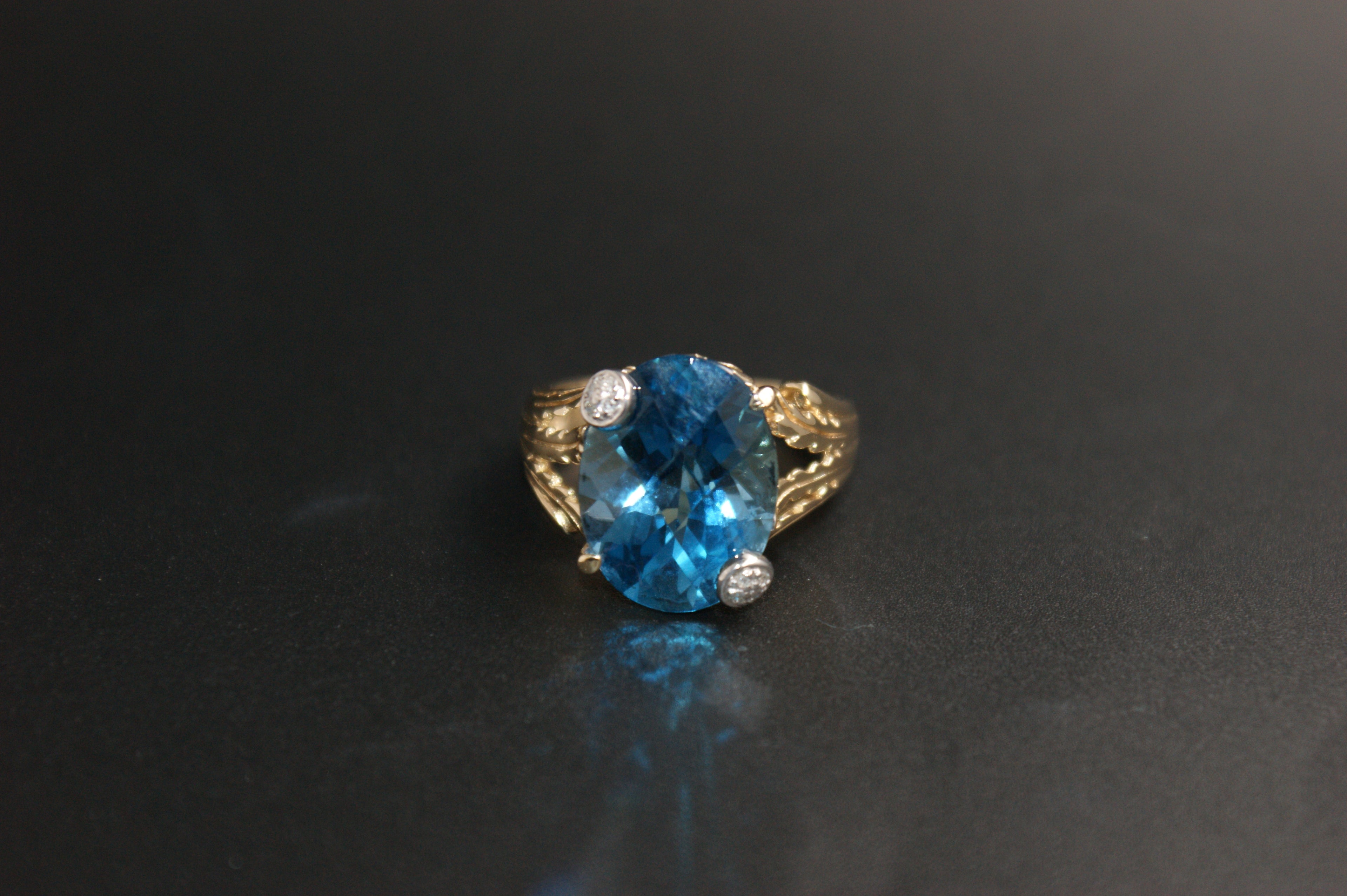 045- 9ct Blue Topaz & Diamond Solitaire Ring