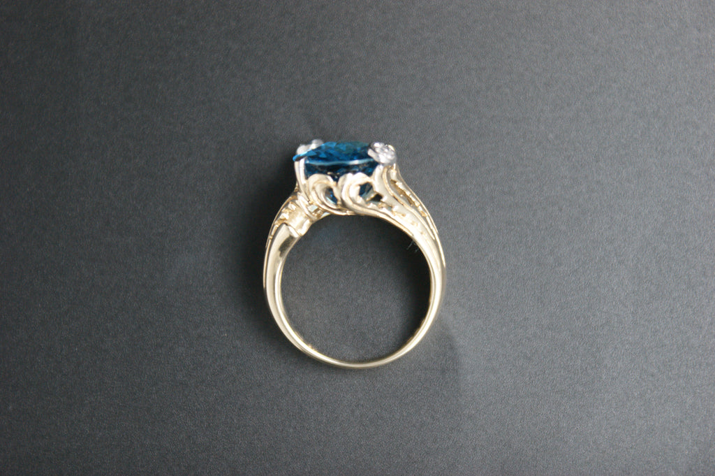 045- 9ct Blue Topaz & Diamond Solitaire Ring