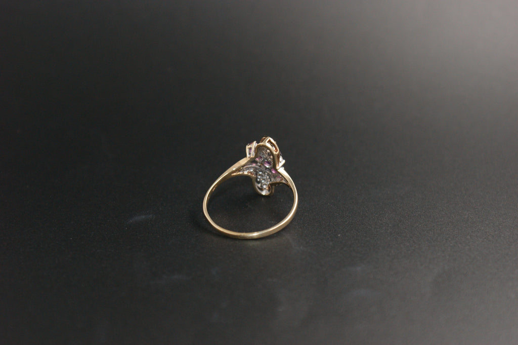 047-9ct Gold Ruby & Diamond Crossover Ring