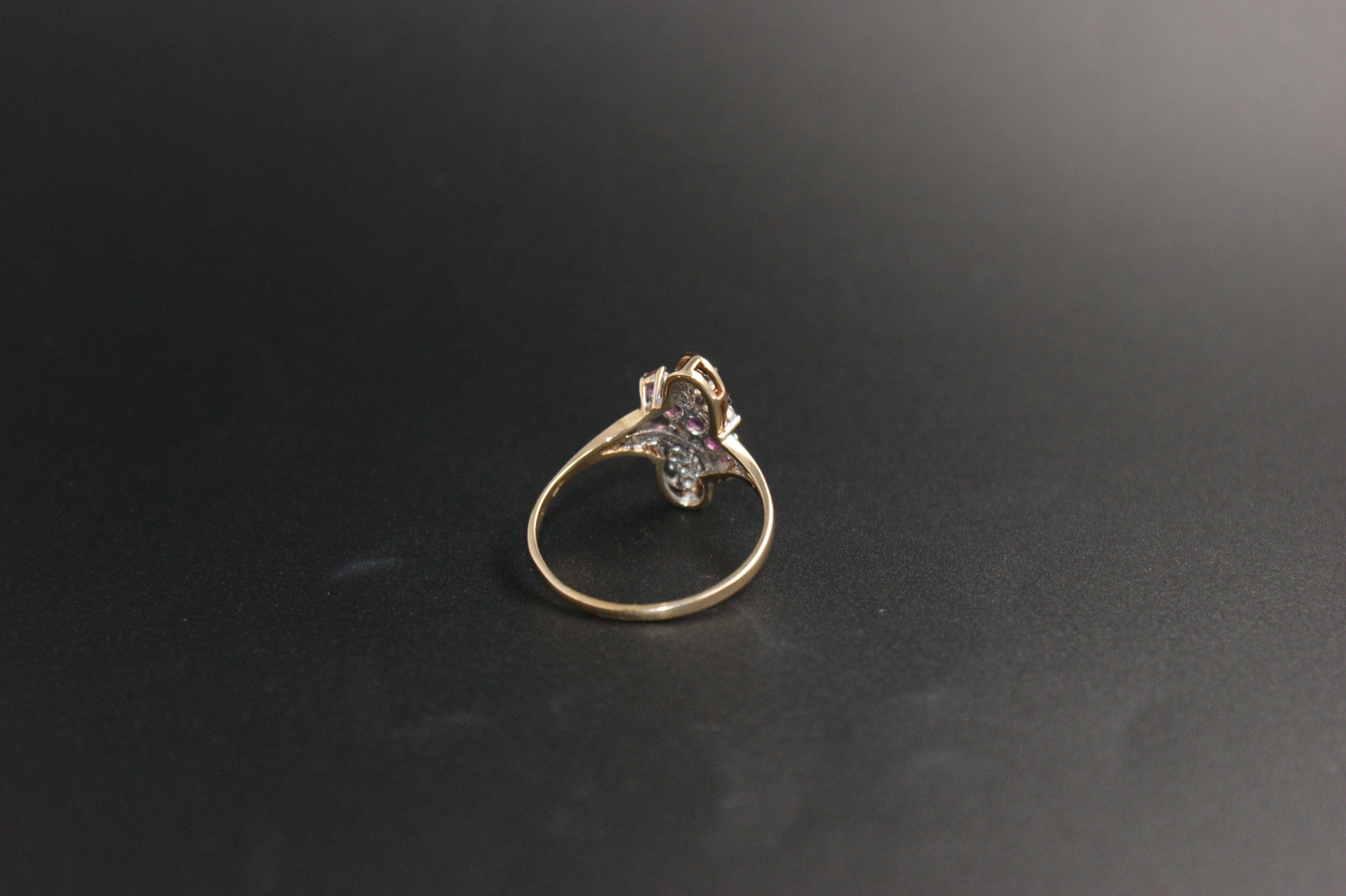 047-9ct Gold Ruby & Diamond Crossover Ring