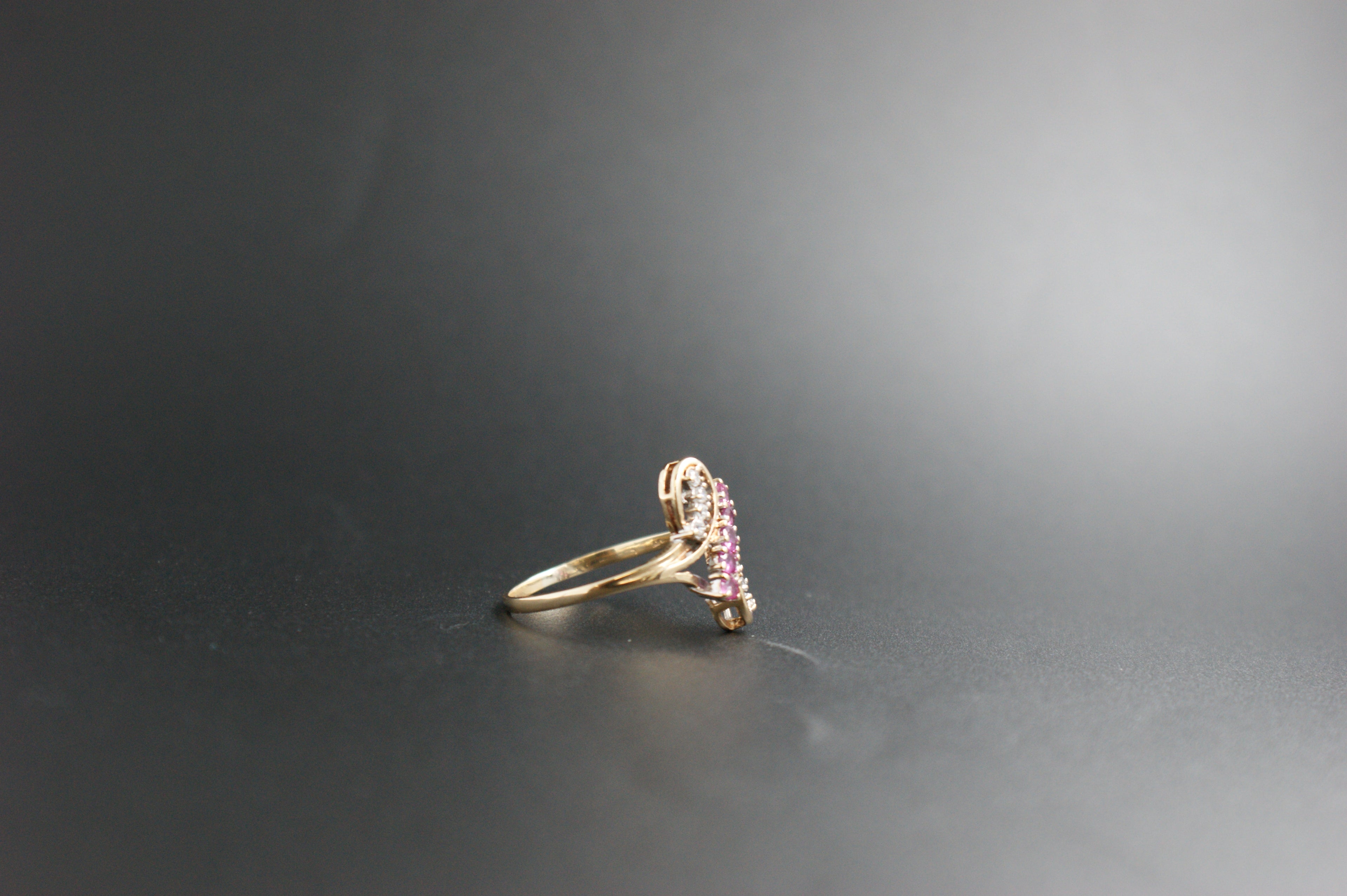 047-9ct Gold Ruby & Diamond Crossover Ring