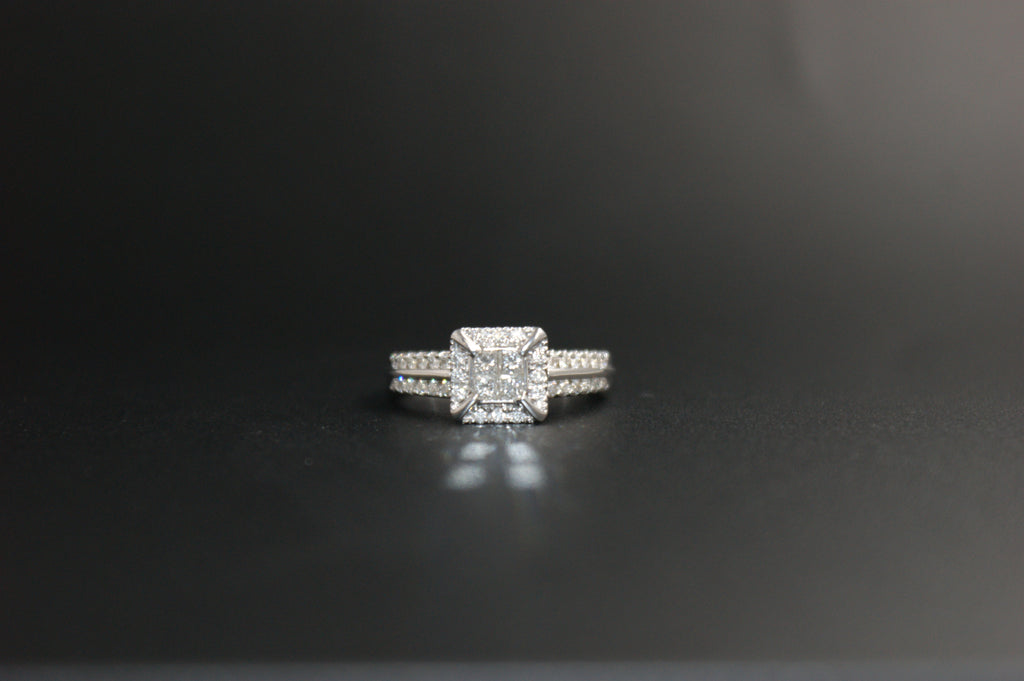 058- 18ct white diamond halo ring