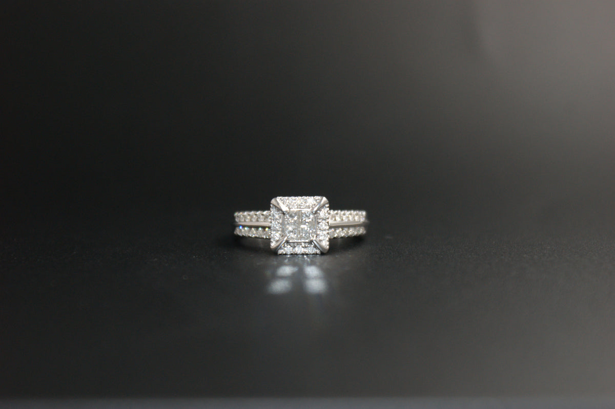 058- 18ct white diamond halo ring
