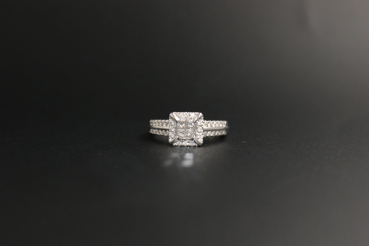 058- 18ct white diamond halo ring