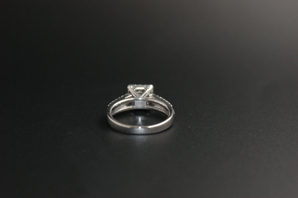 058- 18ct white diamond halo ring