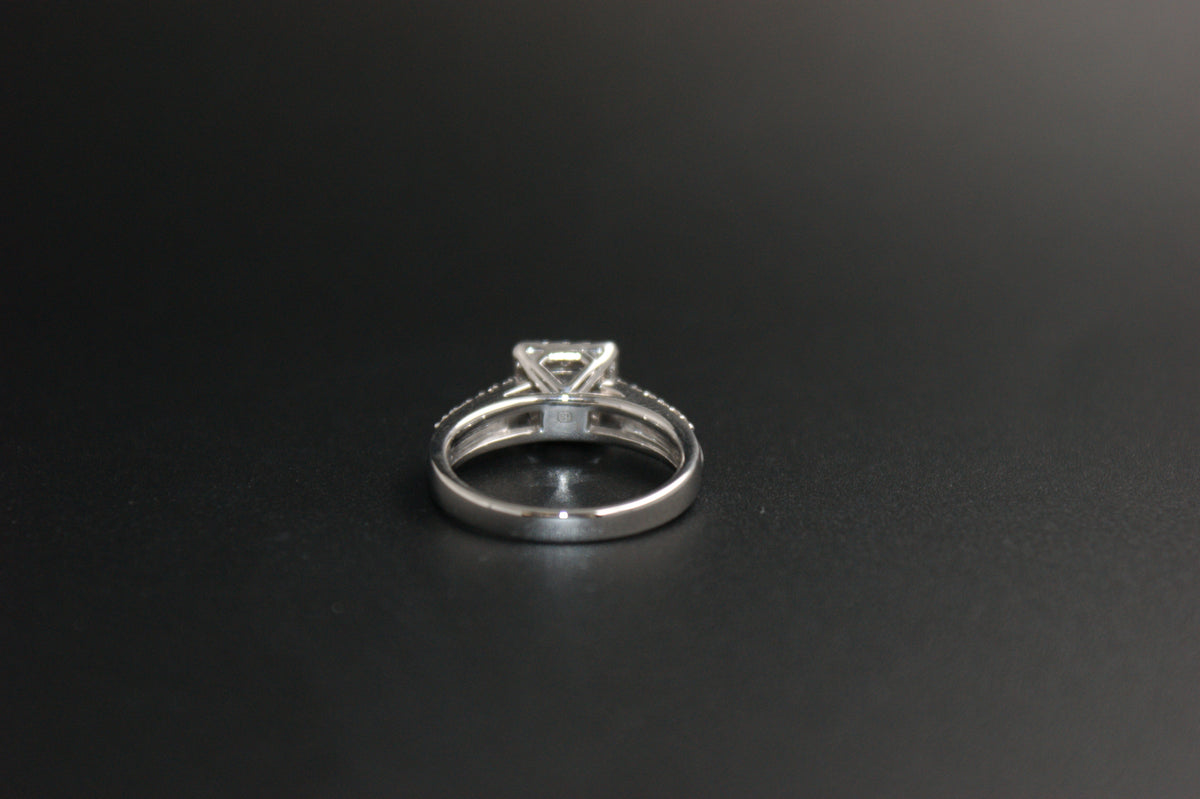 058- 18ct white diamond halo ring