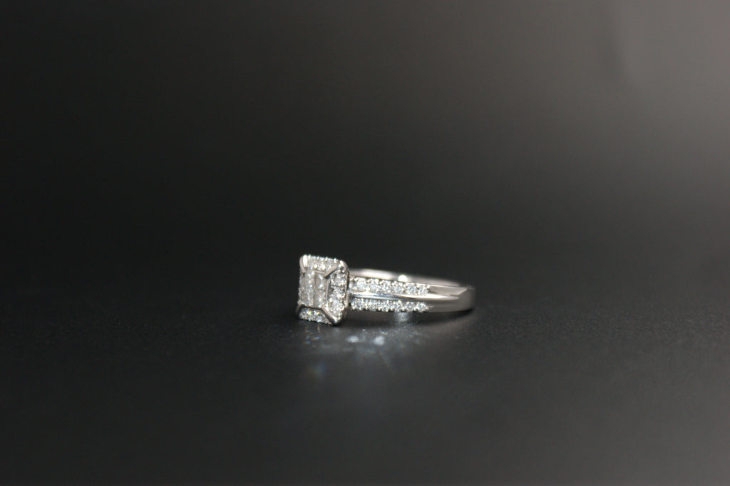 058- 18ct white diamond halo ring