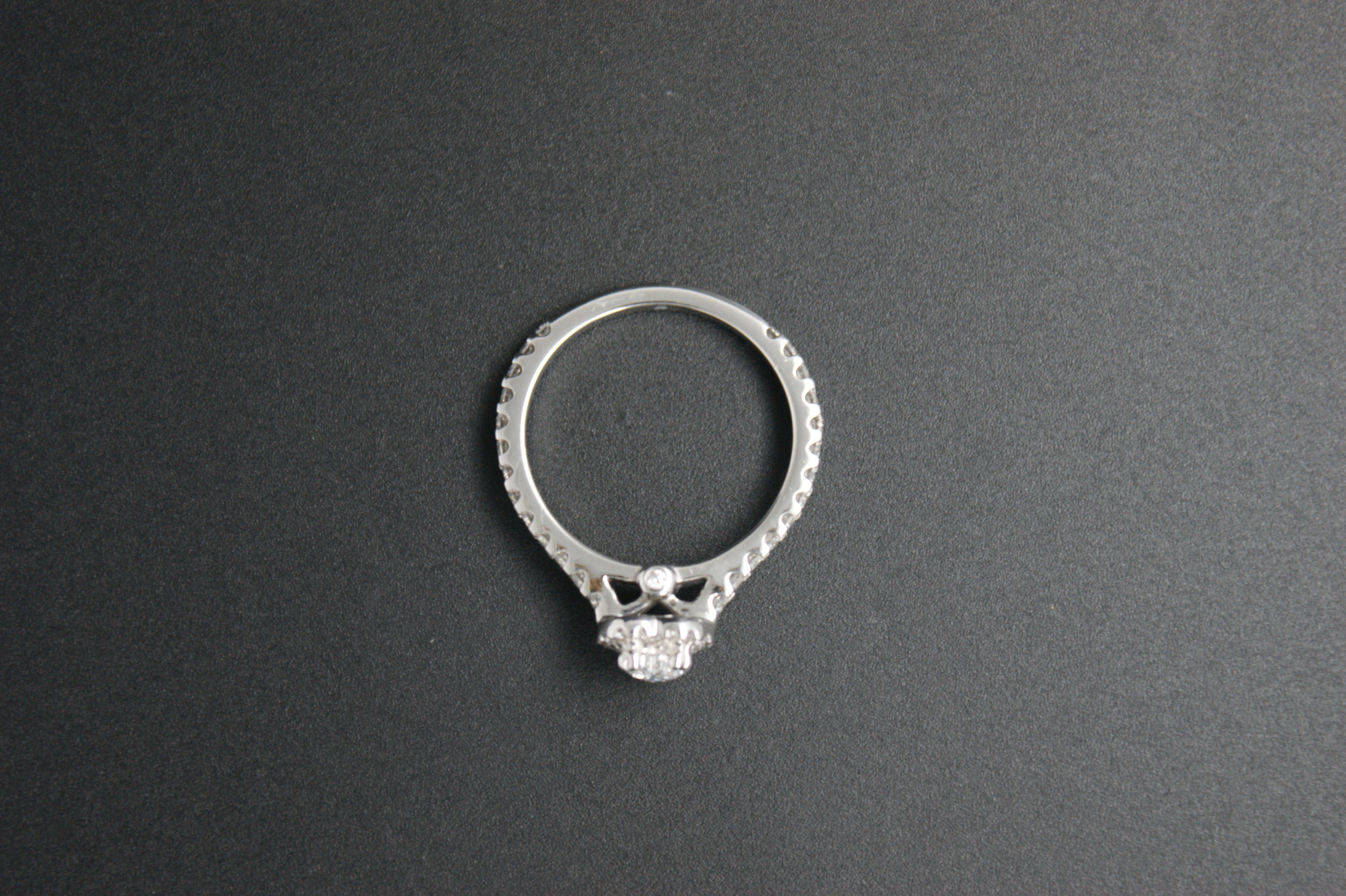 069- Platinum Heart-Cut Diamond Halo Ring with Pave Band