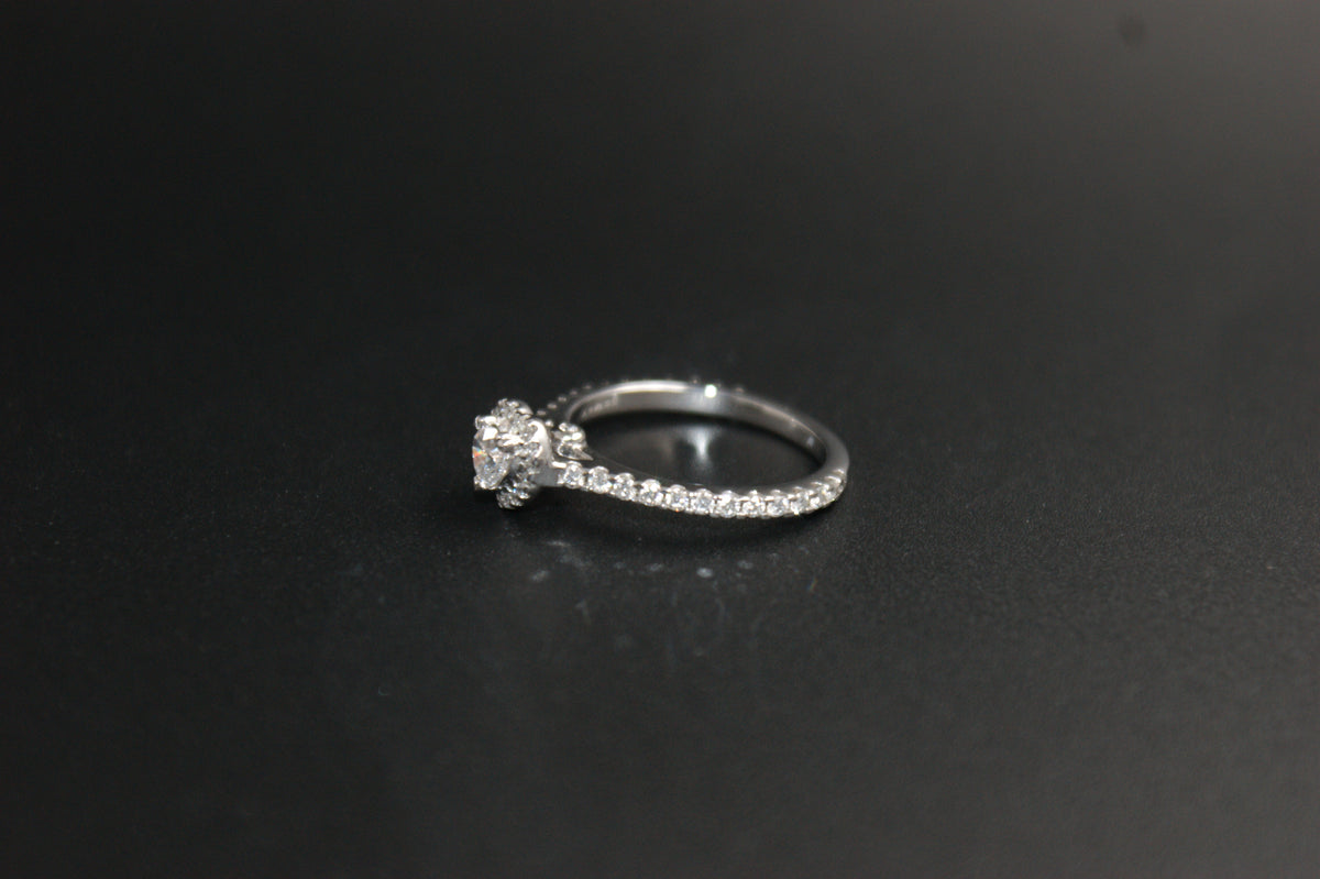 069- Platinum Heart-Cut Diamond Halo Ring with Pave Band