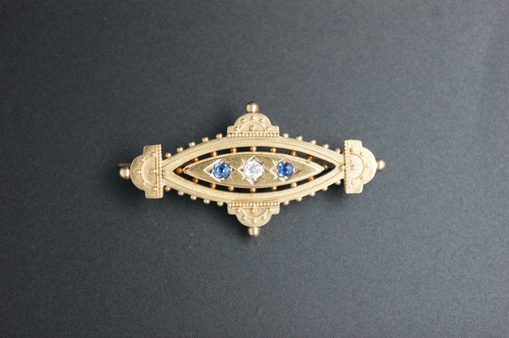 083- 15ct sapphire and diamond Brooch.