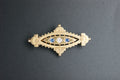 083- 15ct sapphire and diamond Brooch.