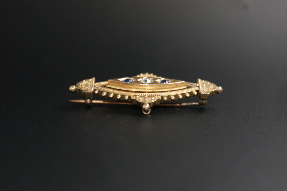 083- 15ct sapphire and diamond Brooch.