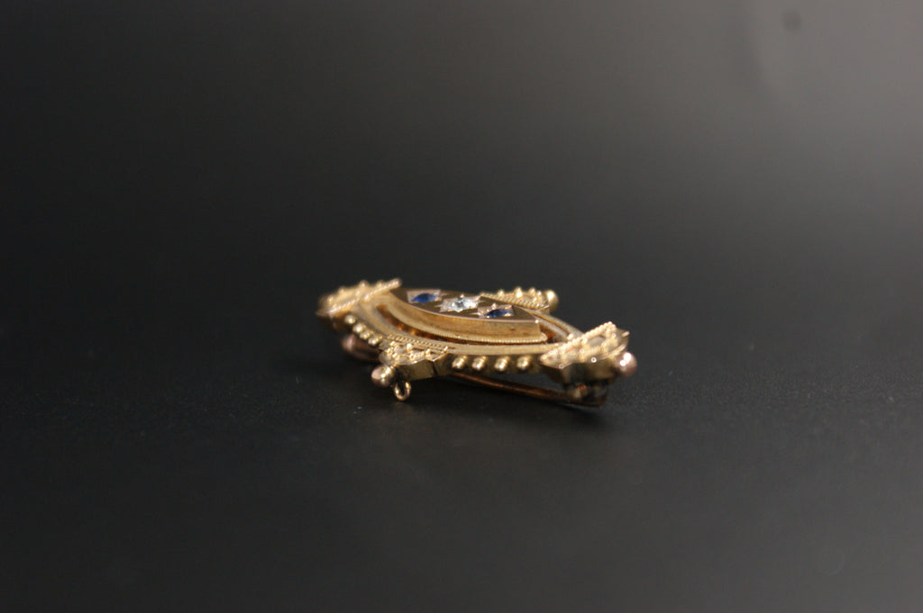 083- 15ct sapphire and diamond Brooch.
