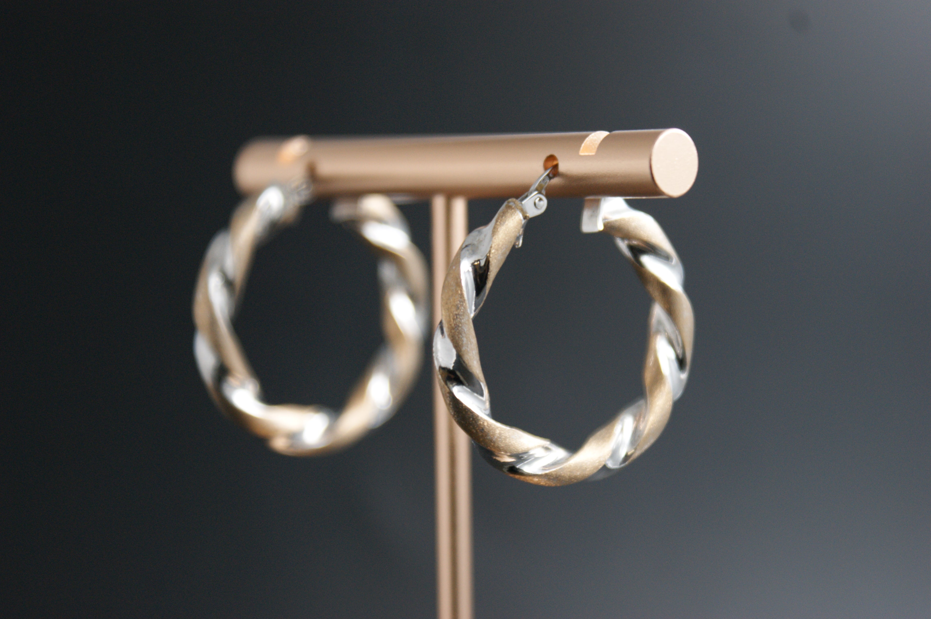087- 9ct yellow and white gold twist hoop earrings.