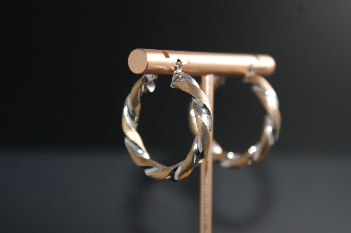 087- 9ct yellow and white gold twist hoop earrings.