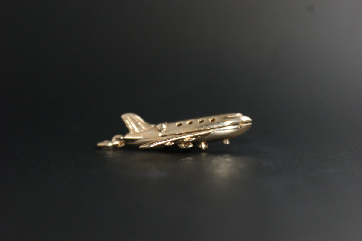 091- 9ct Gold Opening ''Bon Voyage'' Aeroplane Charm