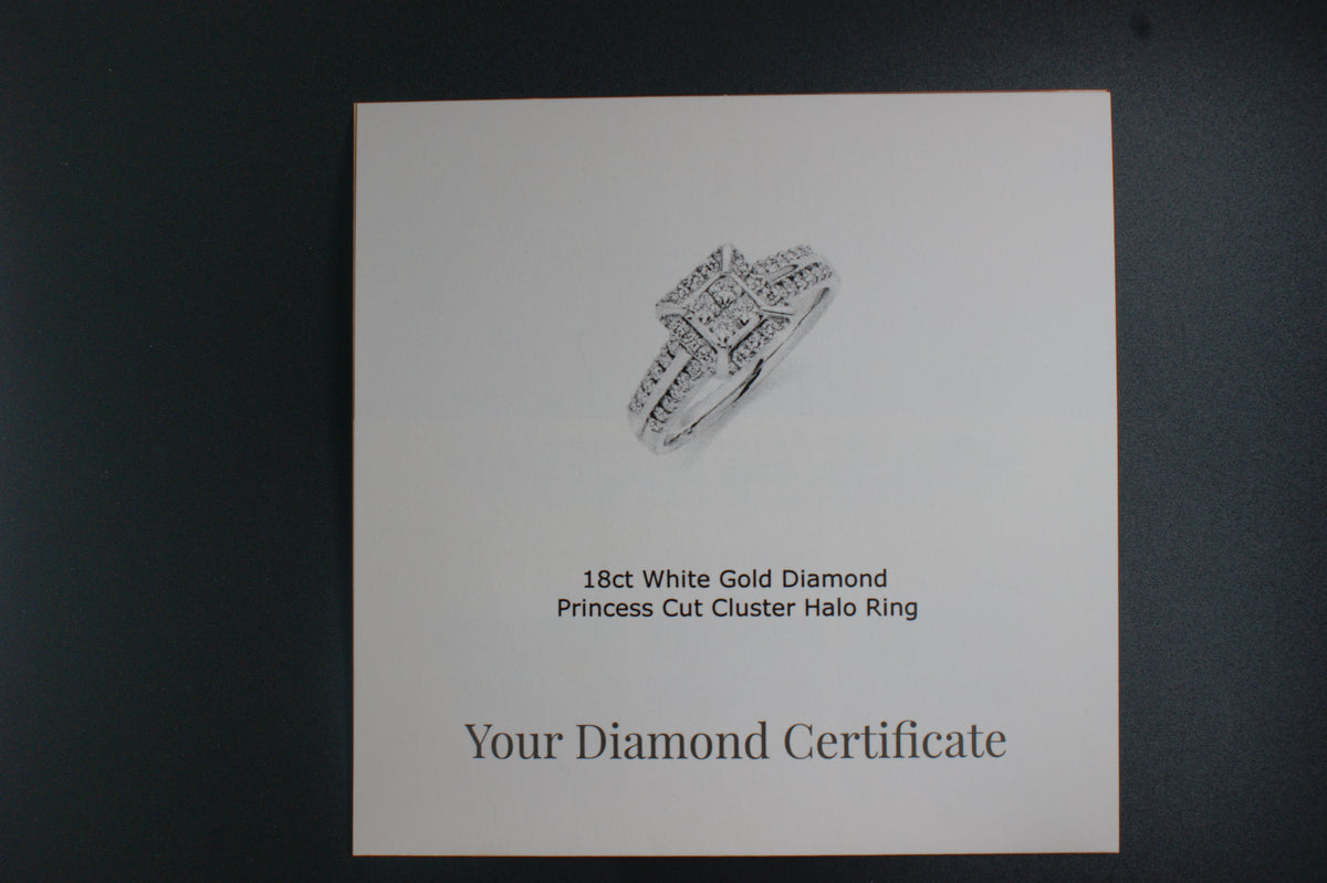 058- 18ct white diamond halo ring