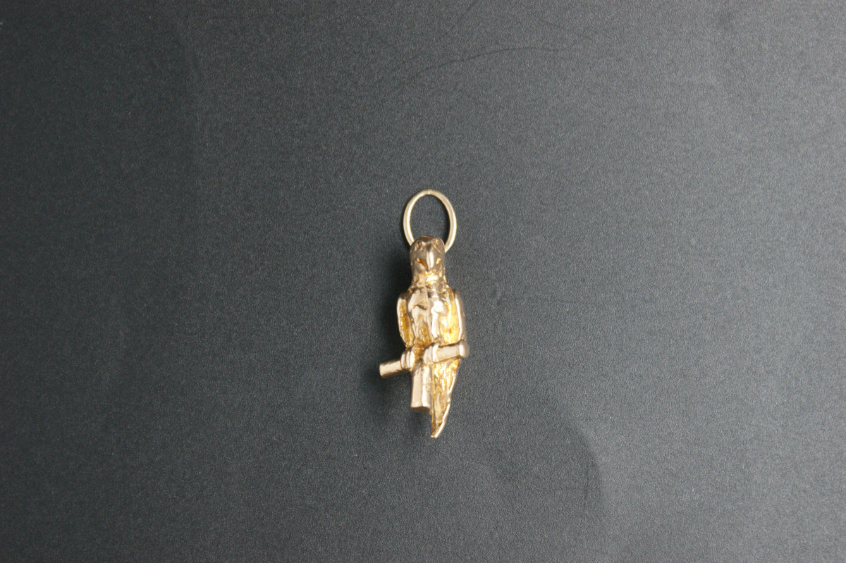093-Gold Perched Parrot Charm