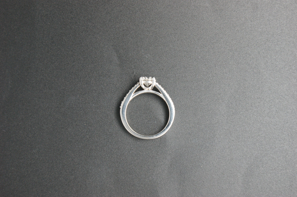 097-Platinum 063ct Solitaire Diamond Ring with Pave Shoulders