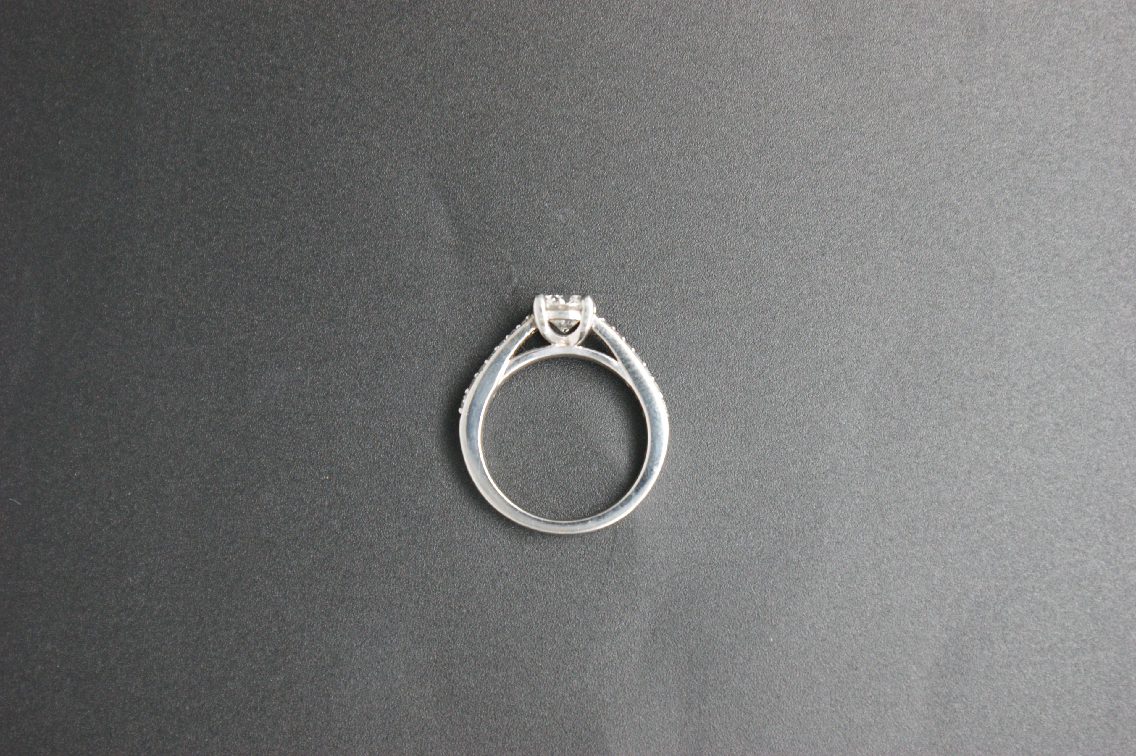 097-Platinum 063ct Solitaire Diamond Ring with Pave Shoulders