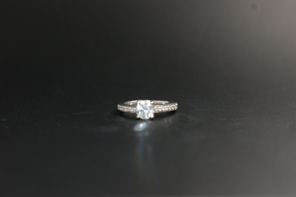 097-Platinum 063ct Solitaire Diamond Ring with Pave Shoulders