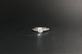 097-Platinum 063ct Solitaire Diamond Ring with Pave Shoulders