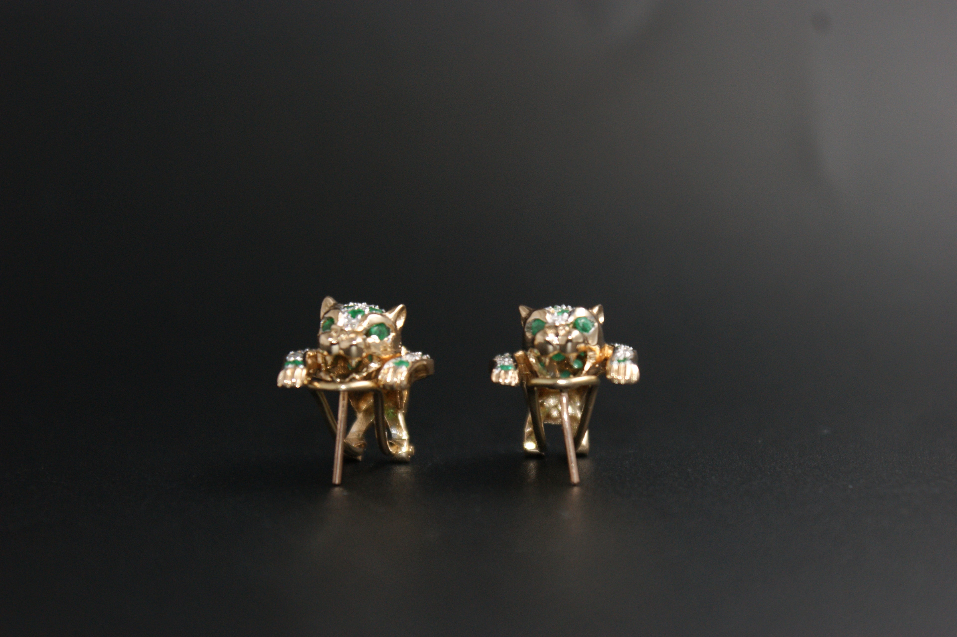 0123- 14ct emerald/diamond panther earrings.