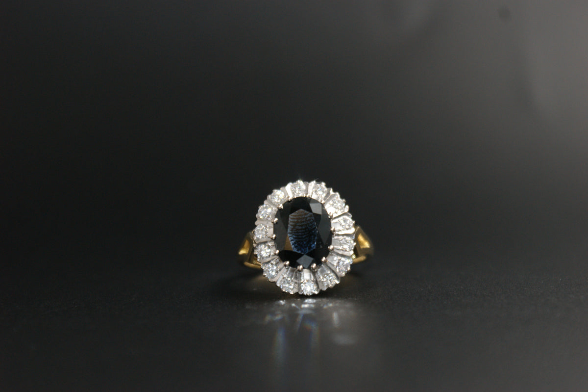 0131- 18ct Gold Sapphire and Diamond Cluster Ring