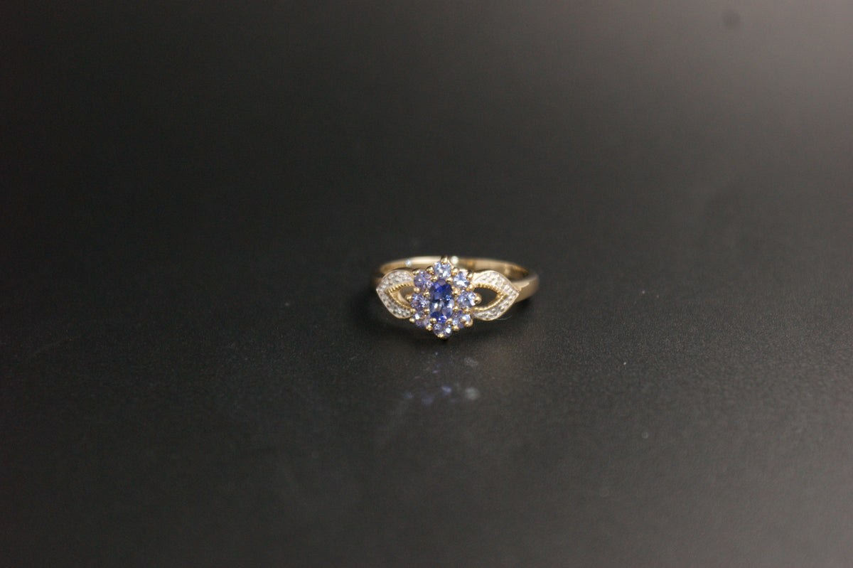 0145- 9ct Gold Iolite and Cluster Ring