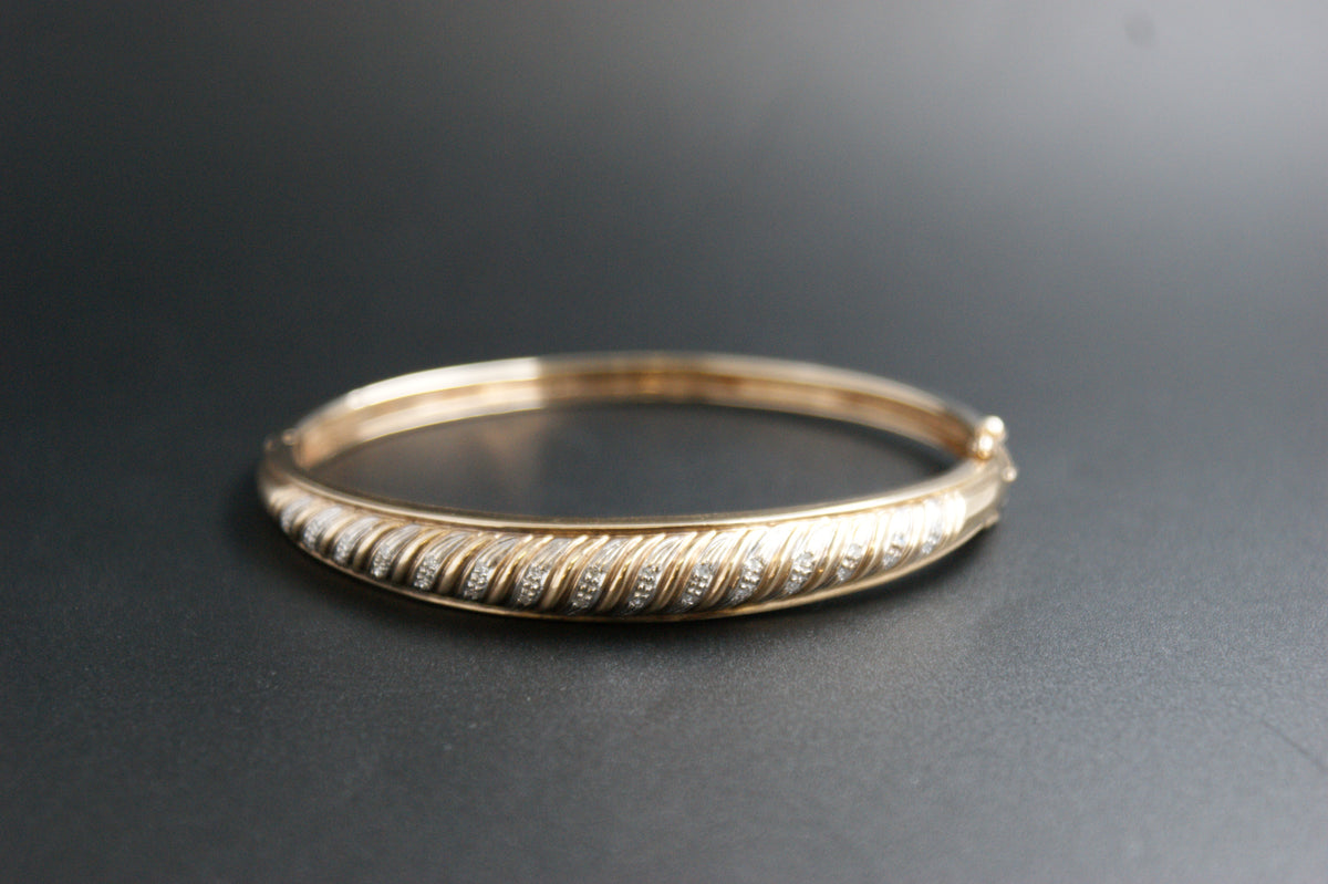 0169- 9ct Gold Diamond Twist-Front Bangle