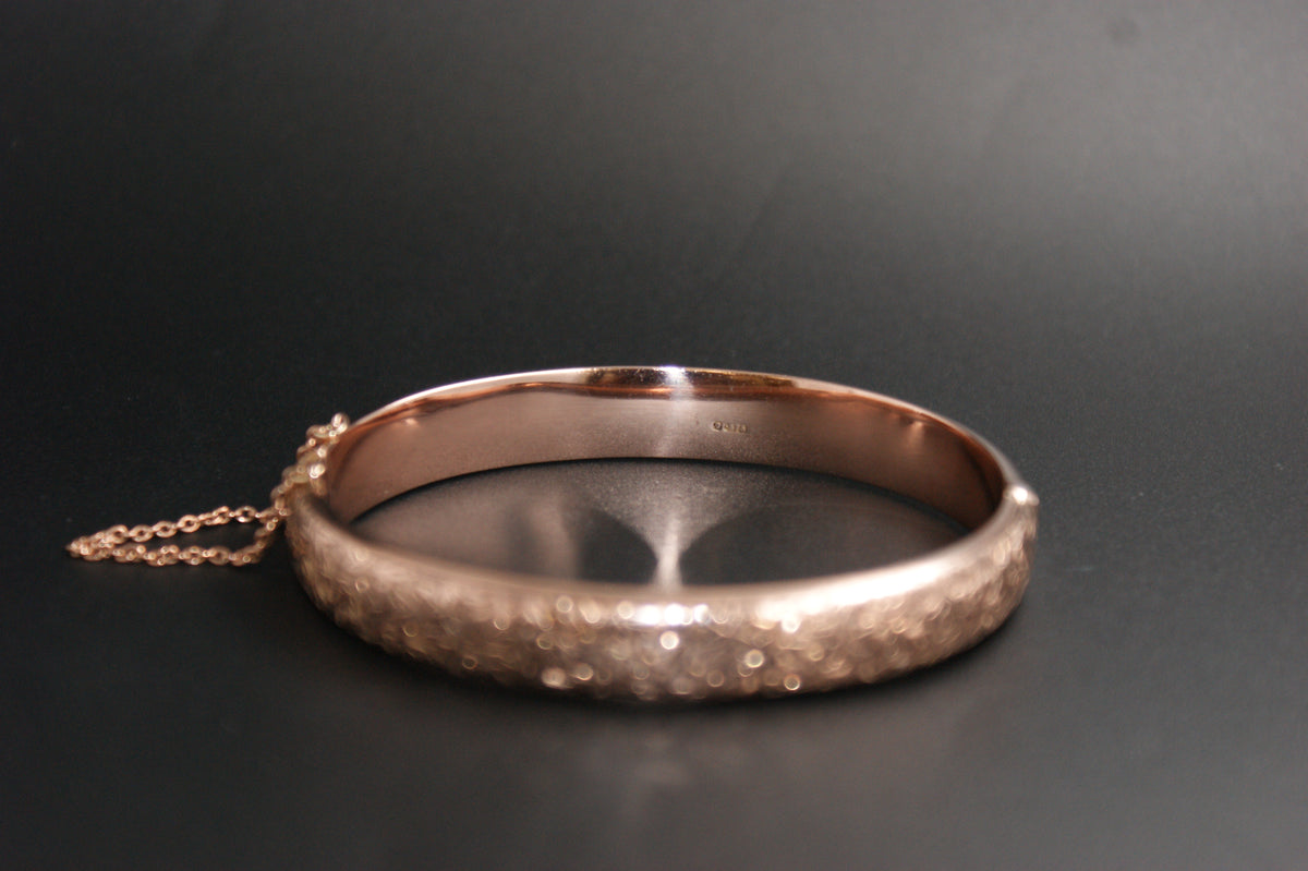 0172- 9ct Rose Gold Floral Bangle
