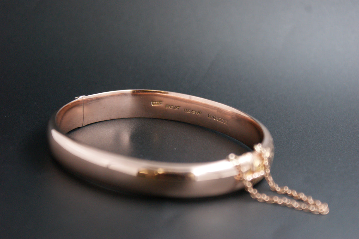 0172- 9ct Rose Gold Floral Bangle