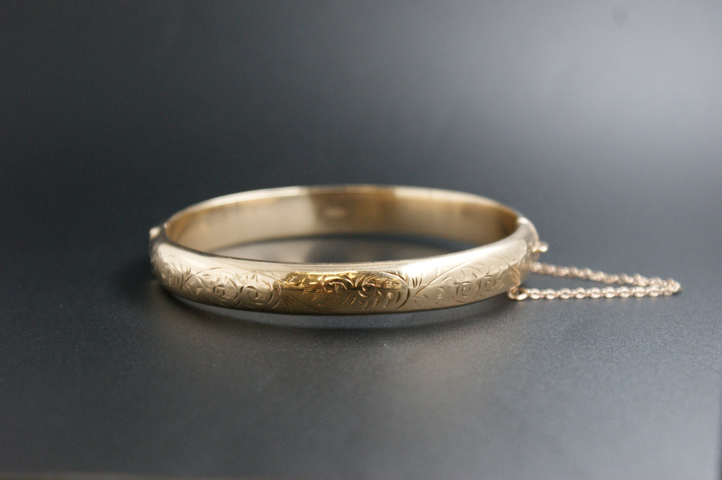 0173- 9ct Gold Engraved Scroll-Front Hinged Bangle