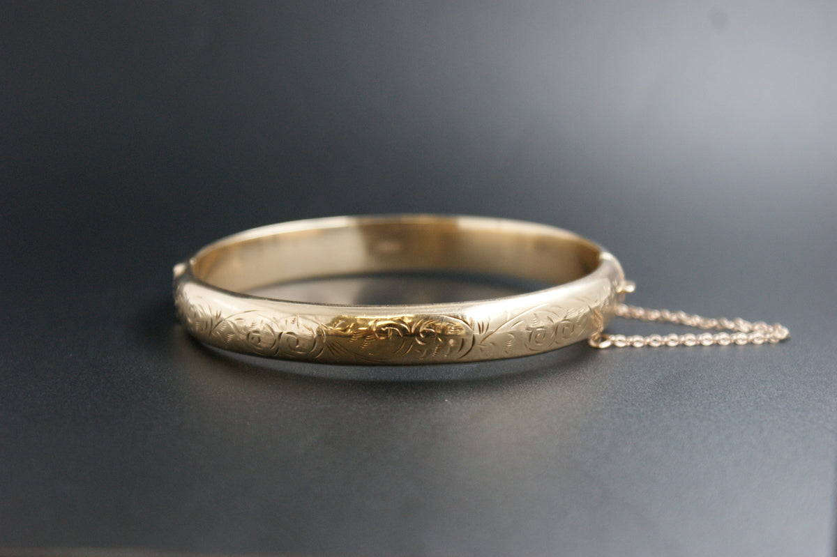 0173- 9ct Gold Engraved Scroll-Front Hinged Bangle