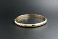 0174- 14ct Yellow Gold Diamond-Cut Patterned Hinged Bangle