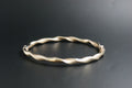 0176- 9ct Gold Twisted Ribbon Bangle